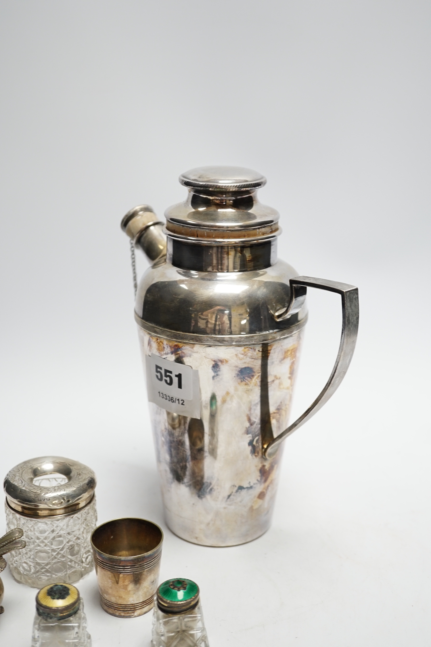 A plated cocktail shaker and sundry small silverwares including silver salt with Bristol blue glass liner, largest 23cm high